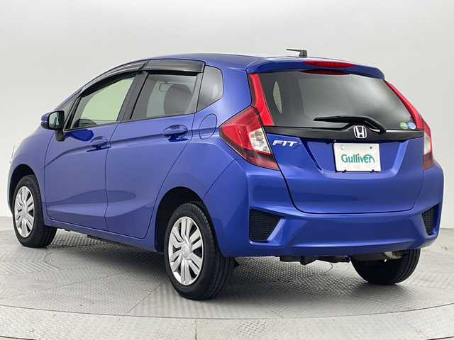 ホンダ フィット 13G Fパッケージ 新潟県 2015(平27)年 7.1万km ブリリアントスポーティブルーメタリック2トーン 4WD/スマートキー/メモリナビ　型式MDV-L402/CD/DVD/SD/ワンセグ/バックカメラ/バイザー/フロアマット/スタッドレスタイヤ4本セット/取扱説明書