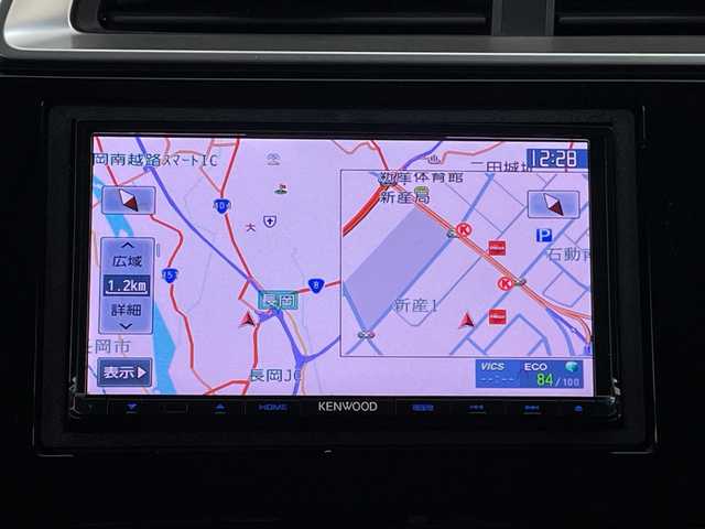 ホンダ フィット 13G Fパッケージ 新潟県 2015(平27)年 7.1万km ブリリアントスポーティブルーメタリック2トーン 4WD/スマートキー/メモリナビ　型式MDV-L402/CD/DVD/SD/ワンセグ/バックカメラ/バイザー/フロアマット/スタッドレスタイヤ4本セット/取扱説明書