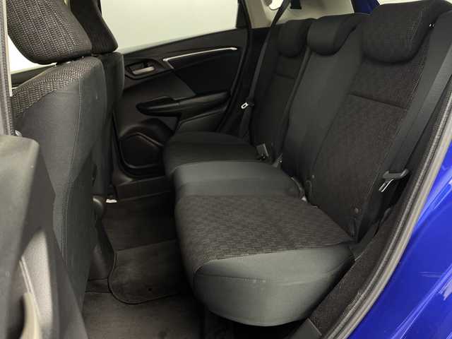 ホンダ フィット 13G Fパッケージ 新潟県 2015(平27)年 7.1万km ブリリアントスポーティブルーメタリック2トーン 4WD/スマートキー/メモリナビ　型式MDV-L402/CD/DVD/SD/ワンセグ/バックカメラ/バイザー/フロアマット/スタッドレスタイヤ4本セット/取扱説明書