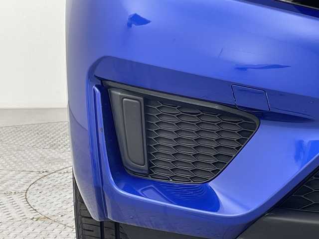 ホンダ フィット 13G Fパッケージ 新潟県 2015(平27)年 7.1万km ブリリアントスポーティブルーメタリック2トーン 4WD/スマートキー/メモリナビ　型式MDV-L402/CD/DVD/SD/ワンセグ/バックカメラ/バイザー/フロアマット/スタッドレスタイヤ4本セット/取扱説明書