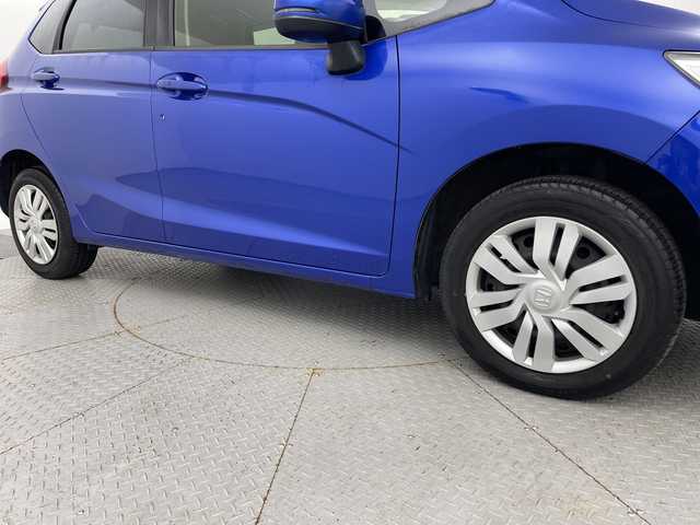 ホンダ フィット 13G Fパッケージ 新潟県 2015(平27)年 7.1万km ブリリアントスポーティブルーメタリック2トーン 4WD/スマートキー/メモリナビ　型式MDV-L402/CD/DVD/SD/ワンセグ/バックカメラ/バイザー/フロアマット/スタッドレスタイヤ4本セット/取扱説明書