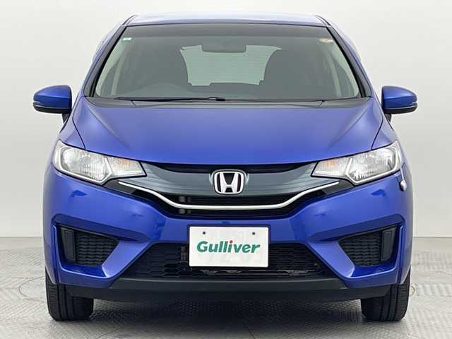 ホンダ フィット 13G Fパッケージ 新潟県 2015(平27)年 7.1万km ブリリアントスポーティブルーメタリック2トーン 4WD/スマートキー/メモリナビ　型式MDV-L402/CD/DVD/SD/ワンセグ/バックカメラ/バイザー/フロアマット/スタッドレスタイヤ4本セット/取扱説明書