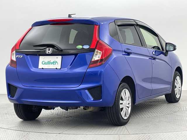 ホンダ フィット 13G Fパッケージ 新潟県 2015(平27)年 7.1万km ブリリアントスポーティブルーメタリック2トーン 4WD/スマートキー/メモリナビ　型式MDV-L402/CD/DVD/SD/ワンセグ/バックカメラ/バイザー/フロアマット/スタッドレスタイヤ4本セット/取扱説明書