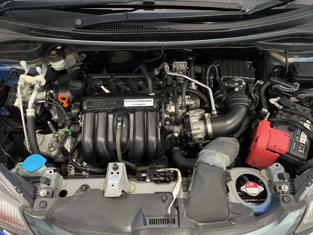 ホンダ フィット 13G Fパッケージ 新潟県 2015(平27)年 7.1万km ブリリアントスポーティブルーメタリック2トーン 4WD/スマートキー/メモリナビ　型式MDV-L402/CD/DVD/SD/ワンセグ/バックカメラ/バイザー/フロアマット/スタッドレスタイヤ4本セット/取扱説明書