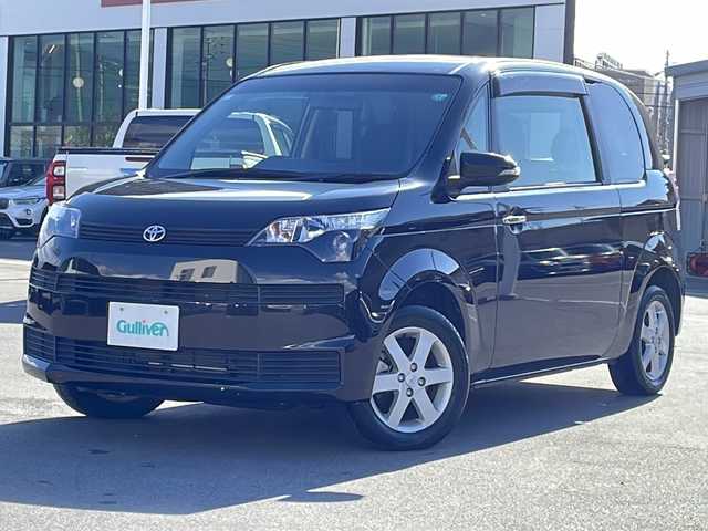 トヨタ スペイド G 長野県 2015(平27)年 1.5万km ブラックマイカ 禁煙車/４ＷＤ/社外ナビ【CN-R300WD】/（ＣＤ／ＤＶＤ／フルセグＴＶ）/バックカメラ/片側パワースライドドア/シートヒーター/革巻きステアリング/リモコンキー/電動格納ミラー/センターデフロック/純正１５インチＡＷ/純正フロアマット