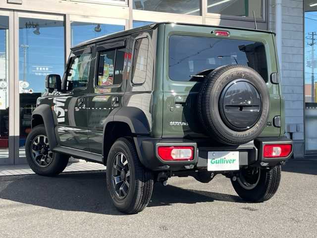 スズキ ジムニー ノマド FC 青森県 2025(令7)年 0.1千km ＤグリーンＭ ワンオーナー/令和7年10月登録/登録時総走行距離33キロ/クルーズコントロール、追従走行あり/アイドリングストップ/D/N席シートヒーター/パーキングアシスト/背面タイヤ/衝突被害軽減システム/コーナーセンサー/横滑り防止装置/レーンアシスト/純正LEDヘッドライト/フォグランプ/スペアキー/取扱説明書/保証書