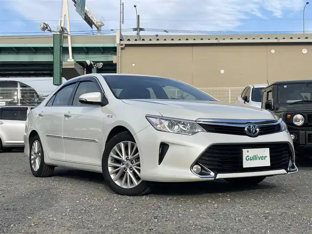 トヨタ カムリ ハイブリット Gパッケージ 福岡県 2016(平28)年 9.3万km ホワイトパールクリスタルシャイン 純正8型SDナビ(フルセグTV/CD/DVD/BT)/バックカメラ/衝突軽減/横滑り防止/ドラレコ/ETC/純正フロアマット/純正LED/純正アルミホイール/プッシュスタート/スマートキー