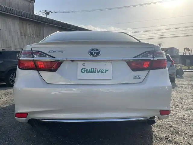 トヨタ カムリ ハイブリット Gパッケージ 福岡県 2016(平28)年 9.3万km ホワイトパールクリスタルシャイン 純正8型SDナビ(フルセグTV/CD/DVD/BT)/バックカメラ/衝突軽減/横滑り防止/ドラレコ/ETC/純正フロアマット/純正LED/純正アルミホイール/プッシュスタート/スマートキー