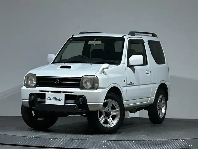 スズキ ジムニー ランドベンチャー 愛媛県 2005(平17)年 17.4万km パールホワイトマイカ 社外HDDナビ（CDDVDワンセグ）純正アルミホイール　純正フロアマット　ルーフレール　シートヒーター　背面タイヤ　ETC　ハーフレーザー　リモコンキー　スペアキー　ABS　キセノンヘットライト