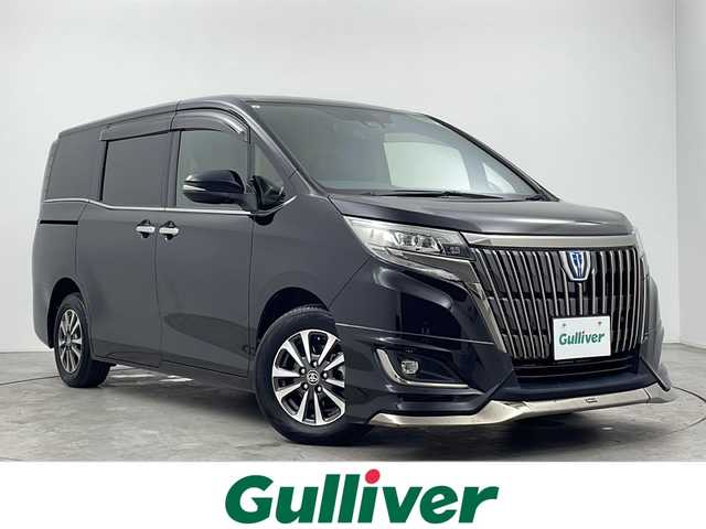 トヨタ エスクァイア ハイブリッド Gi プレミアムパッケージ ブラックテーラード 大阪府 2021(令3)年 4.8万km ブラック 禁煙車/純正10インチナビ/・フルセグ/Bluetooth/CD/DVD/AM/FM/USB/SD/純正12インチフリップダウンモニター/モデリスタエアロ/ステアリングヒーター/前席シートヒーター/バックカメラ/両側パワースライドドア/ビルトインETC/クルーズコントロール/ハーフレザーシート/トヨタセーフティセンス/・プリクラッシュセーフティ/・レーンキープアシスト/・PKSB/先行車発進告知/・クリアランスソナー/純正15インチAW