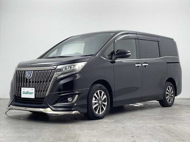 トヨタ エスクァイア ハイブリッド Gi プレミアムパッケージ ブラックテーラード 三重県 2021(令3)年 4.8万km ブラック 禁煙車/純正10インチナビ/・フルセグ/Bluetooth/CD/DVD/AM/FM/USB/SD/純正12インチフリップダウンモニター/モデリスタエアロ/ステアリングヒーター/前席シートヒーター/バックカメラ/両側パワースライドドア/ビルトインETC/クルーズコントロール/ハーフレザーシート/トヨタセーフティセンス/・プリクラッシュセーフティ/・レーンキープアシスト/・PKSB/先行車発進告知/・クリアランスソナー/純正15インチAW