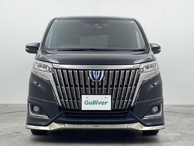 トヨタ エスクァイア ハイブリッド Gi プレミアムパッケージ ブラックテーラード 三重県 2021(令3)年 4.8万km ブラック 禁煙車/純正10インチナビ/・フルセグ/Bluetooth/CD/DVD/AM/FM/USB/SD/純正12インチフリップダウンモニター/モデリスタエアロ/ステアリングヒーター/前席シートヒーター/バックカメラ/両側パワースライドドア/ビルトインETC/クルーズコントロール/ハーフレザーシート/トヨタセーフティセンス/・プリクラッシュセーフティ/・レーンキープアシスト/・PKSB/先行車発進告知/・クリアランスソナー/純正15インチAW