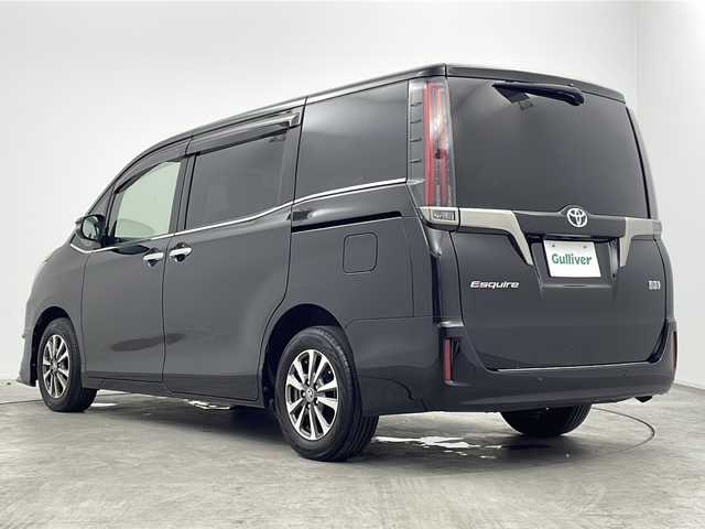 トヨタ エスクァイア ハイブリッド Gi プレミアムパッケージ ブラックテーラード 三重県 2021(令3)年 4.8万km ブラック 禁煙車/純正10インチナビ/・フルセグ/Bluetooth/CD/DVD/AM/FM/USB/SD/純正12インチフリップダウンモニター/モデリスタエアロ/ステアリングヒーター/前席シートヒーター/バックカメラ/両側パワースライドドア/ビルトインETC/クルーズコントロール/ハーフレザーシート/トヨタセーフティセンス/・プリクラッシュセーフティ/・レーンキープアシスト/・PKSB/先行車発進告知/・クリアランスソナー/純正15インチAW