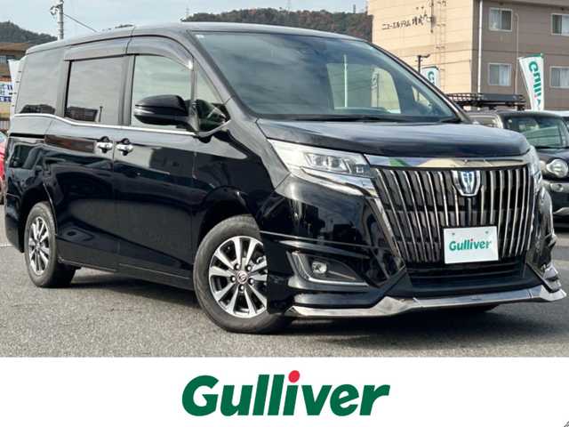 トヨタ エスクァイア ハイブリッド Gi プレミアムパッケージ ブラックテーラード 広島県 2021(令3)年 4.8万km ブラック 純正10インチナビ/・フルセグ/Bluetooth/CD/DVD/AM/FM/USB/SD/純正12インチフリップダウンモニター/モデリスタエアロ/ステアリングヒーター/前席シートヒーター/バックカメラ/両側パワースライドドア/ビルトインETC/クルーズコントロール/ハーフレザーシート/トヨタセーフティセンス/・プリクラッシュセーフティ/・レーンキープアシスト/・PKSB/先行車発進告知/・クリアランスソナー/純正15インチAW/LEDヘッドライト