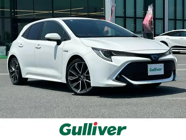 トヨタ カローラ スポーツ ハイブリッドG Z 奈良県 2019(令1)年 2.6万km スーパーホワイトⅡ 純正ナビ　/フルセグＴＶ　/BT/CD/DVD/SD/USB/ドライブレコーダー　/バックカメラ　/純正ＥＴＣ　/追従型クルーズコントロール　/ハーフレザーシート　/シートヒーター　/フォグランプ　/スマートキー　/衝突被害軽減システム　/コーナーセンサー/LEDヘッドライト/オートライト/オートマチックハイビーム/レーンキープアシスト