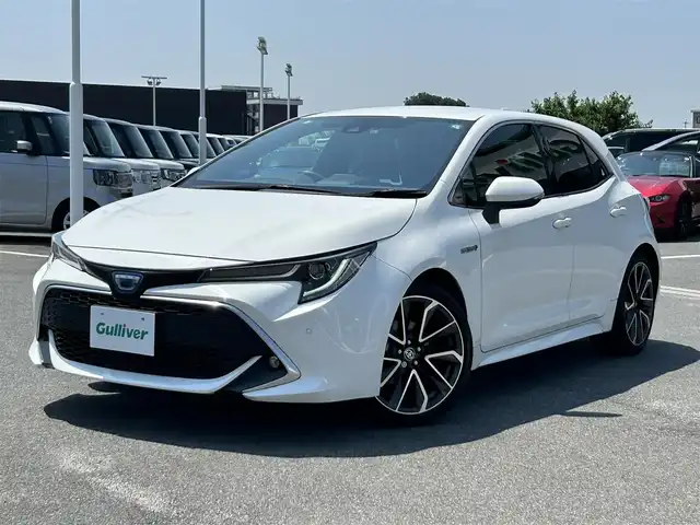 トヨタ カローラ スポーツ ハイブリッドG Z 奈良県 2019(令1)年 2.6万km スーパーホワイトⅡ 純正ナビ　/フルセグＴＶ　/BT/CD/DVD/SD/USB/ドライブレコーダー　/バックカメラ　/純正ＥＴＣ　/追従型クルーズコントロール　/ハーフレザーシート　/シートヒーター　/フォグランプ　/スマートキー　/衝突被害軽減システム　/コーナーセンサー/LEDヘッドライト/オートライト/オートマチックハイビーム/レーンキープアシスト