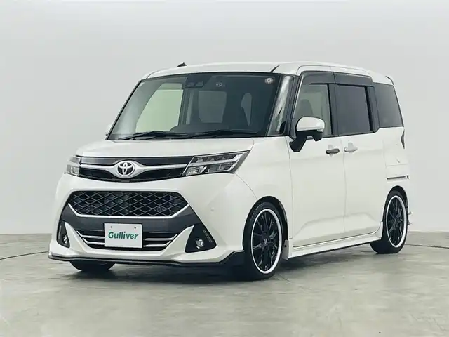 トヨタ タンク カスタムG－T 福島県 2018(平30)年 1.9万km パールホワイトⅢ スマートアシスト/・衝突被害軽減システム/・オートハイビーム/・車線逸脱警報/・先行車発進告知/・パーキングセンサー/ドライブレコーダー前後　/クルーズコントロール　/ＢＬＩＴＺ車高調　/・純正サスショック積み込み/・社外マフラー　/純正CDプレイヤー/【AM/FM/AUX/CD】/型番:CP-W66/両側パワースライドドア　/プッシュスタート　/・スマートキー　/・スペアキー　/LEDライト　/・オートライト　/・フォグライト/革巻きステアリング/・チルトステアリング/・ステアリングスイッチ/取扱説明書
