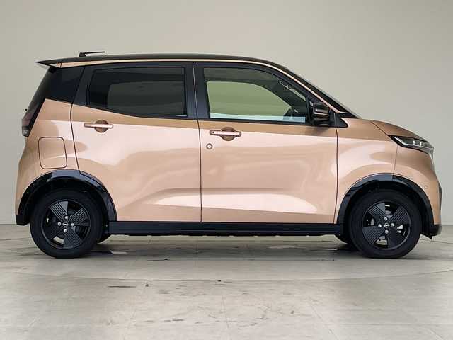 日産 サクラ X 90周年記念車 愛知県 2024(令6)年 0.4万km オレンジ 純正9型ナビ/全方位カメラ/コーナーセンサー/純正アルミホイール/バックカメラ/オートマチックハイビーム/ドライブレコーダー/ＥＴＣ/衝突軽減システム/フルセグ/CD DVD/Bluetooth/ステアリングスイッチ/スマートキー/プッシュスタート