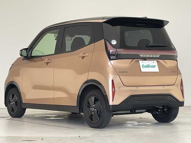 日産 サクラ X 90周年記念車 愛知県 2024(令6)年 0.4万km オレンジ 純正9型ナビ/全方位カメラ/コーナーセンサー/純正アルミホイール/バックカメラ/オートマチックハイビーム/ドライブレコーダー/ＥＴＣ/衝突軽減システム/フルセグ/CD DVD/Bluetooth/ステアリングスイッチ/スマートキー/プッシュスタート