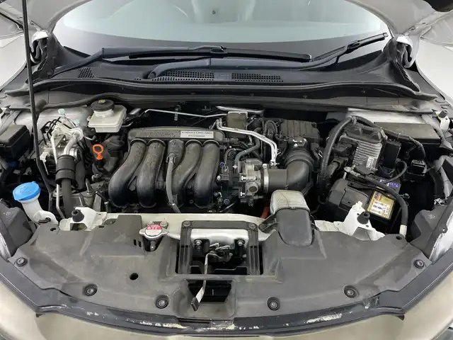 ホンダ ヴェゼル ハイブリッド RS ホンダセンシング 愛知県 2018(平30)年 4万km プラチナホワイトパール 禁煙車/８Vインチナビ/（CD/DVD/Bluetooth/フルセグTV/HDMI)/バックカメラ/ホンダセンシング/・衝突軽減ブレーキ/・レーンキープアシスト/・レーントレーシングアシスト/前後ドライブレコーダー/ETC/シートヒーター/スマートキー/プッシュスタート/純正18インチアルミホイール/純正フロアマット/チップアップシート/LEDヘッドライト/オートライト/フロントフォグランプ/横滑り防止装置
