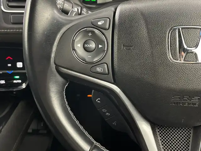 ホンダ ヴェゼル ハイブリッド RS ホンダセンシング 愛知県 2018(平30)年 4万km プラチナホワイトパール 禁煙車/８Vインチナビ/（CD/DVD/Bluetooth/フルセグTV/HDMI)/バックカメラ/ホンダセンシング/・衝突軽減ブレーキ/・レーンキープアシスト/・レーントレーシングアシスト/前後ドライブレコーダー/ETC/シートヒーター/スマートキー/プッシュスタート/純正18インチアルミホイール/純正フロアマット/チップアップシート/LEDヘッドライト/オートライト/フロントフォグランプ/横滑り防止装置