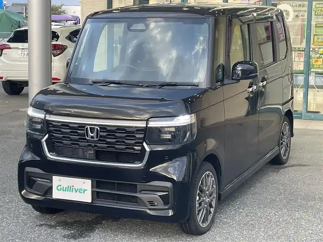 ホンダ Ｎ ＢＯＸ カスタム ターボ 愛知県 2023(令5)年 0.2万km クリスタルブラックパール 登録時走行距離1271km/ワンオーナー/純正9インチSDナビ/(Bluetooth/フルセグTV/DVD)/バックカメラ/コーナーセンサー/ホンダセンシング/衝突軽減ブレーキ/誤発信抑制機能/路外逸脱抑制機能/歩行者事故低減ステアリング/先行車発進告知/標識認識機能/オートハイビーム/レーンキーピングアシスト/アダプティブクルーズコントロール/両側パワスラ/ステアリングスイッチ/ハーフレザーシート/前席シートヒーター/パドルシフト/ヘッドランプレベライザー/マルチインフォメーションディスプレイ/左側アンダーミラー/純正ドアバイザー/純正フロアマット/プッシュスタート/スマートキー/取説/保証書