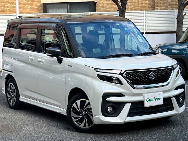 スズキ ソリオ バンディット HV MV 東京都 2023(令5)年 0.3万km ピュアホワイトパール/ガンメタリック2トーン ワンオーナー/純正ナビ(フルセグTV、CD、DVD、Bluetooth)/全席ヒートシーター/全方位カメラ/両側パワースライド/アダプティブクルーズコントロール/デュアルカメラブレーキサポート/前後誤発進抑制機能/後退時ブレーキサポート/オートハイビーム/前後ドライブレコーダー/スペアキー/アイドリングストップ/横滑り防止/取扱説明書/保証書/記録簿