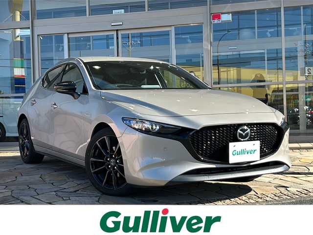 マツダ マツダ３ファストバック 15S ブラックトーンED 静岡県 2023(令5)年 2.1万km プラチナクォーツメタリック 純正ナビ/・FM/AM/・Bluetooth/・USB/・スマートフォン連携/・メモリーオーディオ/主要装備/・衝突軽減/・レーンキープ/・追従クルコン/・BSM/・コーナーセンサー前後/・全方位カメラ/・HUD/・ETC/・ドラレコ前/・ステリモ/・パドルシフト/・電動パーキングブレーキ/・オートホールド/・LEDヘッドライト/・オートライト/・オートハイビーム/・社外フロアマット/・純正アルミホイール