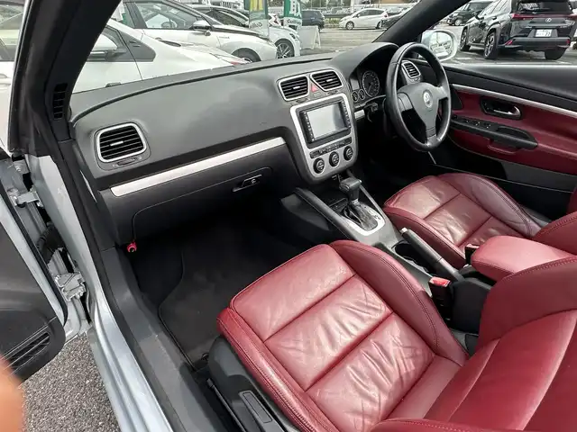 フォルクスワーゲン イオス 2．0T 愛知県 2007(平19)年 5.8万km シルバーエッセンスM ワンオーナー/電動オープン/バックソナー/クルーズコントロール/リモコンキー/ＡＡＣ/HDDナビ/ウィンカーミラー/電動サンルーフ/純正革シート/ETC/純正フォグランプ/ボンネットエアサス/保証書/取扱説明書
