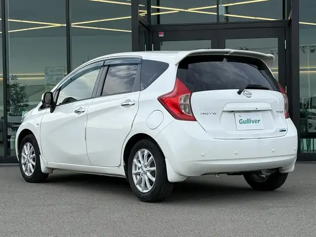 日産 ノート メダリスト エマージェンシーB 東京都 2014(平26)年 7.5万km ブリリアントホワイトパール 純正ナビ（MP313D-W）/・ＴＶ/AM/FM/Bluetooth/AUX/CD/DVD/SD）/ポータブルディスプレイオーディオ/バックカメラ/ドライブレコーダー/ETC/スマートキー/プッシュスタート/オートライト/革巻きステアリング/アイドリングストップ/車線逸脱警報/プリクラッシュセーフティ/リアプライバシーガラス/ドアバイザ―/純正フロアマット/横滑り防止装置/オートエアコン