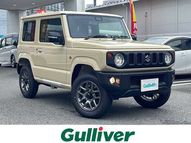 スズキ ジムニー XC 福岡県 2025(令7)年 0.1万km未満 シフォンアイボリーM ワンオーナー/禁煙車/登録時走行距離５キロ/盗難防止装置/衝突被害軽減システム/クルーズコントロール/コーナーセンサー/レーンキープアシスト/横滑り防止装置/エアバッグ（運転席・助手席・サイド）/4WD/ダウンヒルアシストコントロール/スマーートキー/純正フロアマット/背面タイヤ/純正アルミホイール/ABS/オートライト/パワーウィンドウ/LEDライト/保証書/取扱説明書
