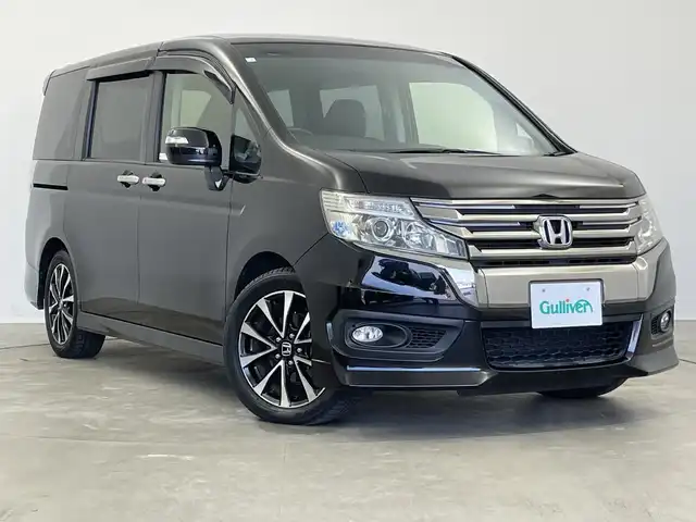 ホンダ ステップワゴン スパーダ Z クールスピリット 新潟県 2014(平26)年 2.7万km プレミアムスパークルブラックパール 純正ナビ（型式：VXM-145VFNi）/・AM/FM/CD/DVD/Bluetooth/フルセグ/バックモニター/クルーズコントロ―ル/両側パワースライドドア/3列シート/ウォークスルー/純正フロアマット/ハーフレザーシート/キセノンヘッドライト/オートライト/純正17インチAW夏タイヤ/ABS/横滑り防止機能/盗難防止装置/保証書/取扱説明書/スペアキー