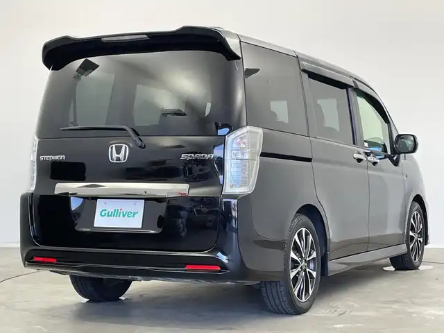 ホンダ ステップワゴン スパーダ Z クールスピリット 新潟県 2014(平26)年 2.7万km プレミアムスパークルブラックパール 純正ナビ（型式：VXM-145VFNi）/・AM/FM/CD/DVD/Bluetooth/フルセグ/バックモニター/クルーズコントロ―ル/両側パワースライドドア/3列シート/ウォークスルー/純正フロアマット/ハーフレザーシート/キセノンヘッドライト/オートライト/純正17インチAW夏タイヤ/ABS/横滑り防止機能/盗難防止装置/保証書/取扱説明書/スペアキー