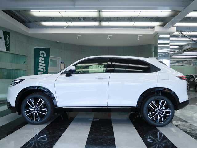 ホンダ ヴェゼル ハイブリッド e:HEV Z 千葉県 2025(令7)年 0.1千km プラチナホワイトパール 登録済未使用車/ホンダコネクトディスプレイ/ナビゲーション/フルセグTV/Bluetooth/AM/FM/USB/マルチビューカメラ/ホンダセンシング/BSI/ブラインドスポットインフォメーション/ハンズフリーアクセスパワーテールゲート/シートヒーター/ステアリングヒーター/ビルトインETC2.0/ハーフレザー /プレミアムオーディオ/純正18インチAW/レーダークルーズコントロール/パドルシフト/ワイヤレス充電/LEDヘッドライト/LEDフォグランプ/USB充電/スマートキー×2本/取説/保証書禁煙車　　前オーナー様の申告により表示しております。当車両の禁煙を保証するものではありません。