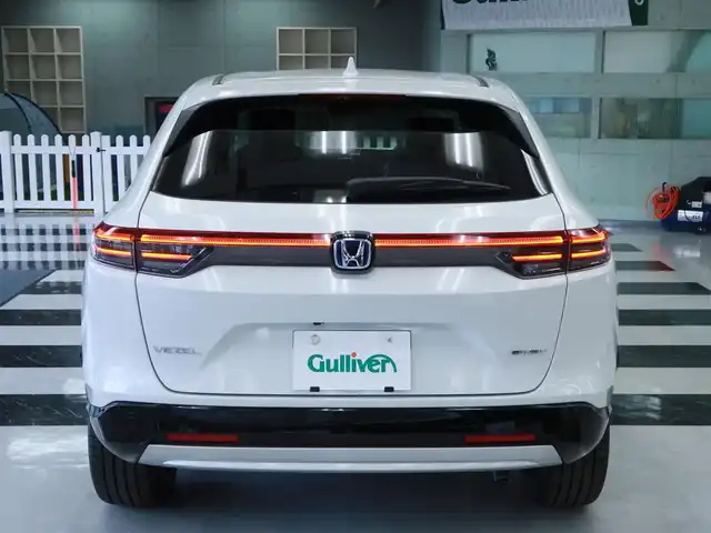 ホンダ ヴェゼル ハイブリッド e:HEV Z 千葉県 2025(令7)年 0.1千km プラチナホワイトパール 登録済未使用車/ホンダコネクトディスプレイ/ナビゲーション/フルセグTV/Bluetooth/AM/FM/USB/マルチビューカメラ/ホンダセンシング/BSI/ブラインドスポットインフォメーション/ハンズフリーアクセスパワーテールゲート/シートヒーター/ステアリングヒーター/ビルトインETC2.0/ハーフレザー /プレミアムオーディオ/純正18インチAW/レーダークルーズコントロール/パドルシフト/ワイヤレス充電/LEDヘッドライト/LEDフォグランプ/USB充電/スマートキー×2本/取説/保証書禁煙車　　前オーナー様の申告により表示しております。当車両の禁煙を保証するものではありません。