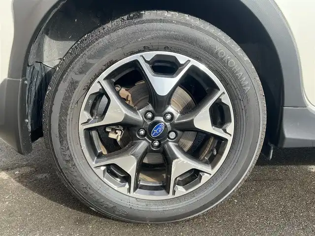 スバル ＸＶ ハイブリッド 2．0e－L アイサイト 秋田県 2020(令2)年 6.9万km クリスタルホワイトP ４WD/衝突軽減システム/LEDヘッドライト/純正SDナビ（DVD/CD/BT/AM/FM/USB）/フルセグ（走行中視聴可能）/バックカメラ/スバル純正１７インチアルミ（夏タイヤ装着）/スマートキー/アイドリングストップ/プッシュスタート/レーンキープアシスト/クルーズコントロール追従走行あり/MTモード付AT/ブラインドスポットモニター/ステアリングスイッチ/パドルシフト/前席パワーシート/運転席メモリー付パワーシート/ドライブレコーダー/ETC/ルーフレール/電動パーキングブレーキ/オートブレーキホールド機能/オートライト/オートエアコン/パワーステアリング/パワーウィンドウ/ヘッドライトレベライザー/横滑り防止/盗難防止装置/寒冷地仕様/電動格納ウィンカーミラー/保証書/取扱説明書/記録簿/スペアキー×１