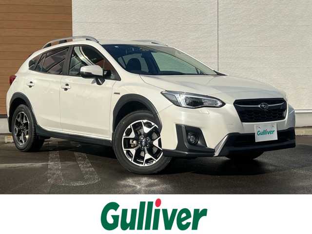 スバル ＸＶ ハイブリッド 2．0e－L アイサイト 秋田県 2020(令2)年 6.9万km クリスタルホワイトP ４WD/衝突軽減システム/LEDヘッドライト/純正SDナビ（DVD/CD/BT/AM/FM/USB）/フルセグ（走行中視聴可能）/バックカメラ/スバル純正１７インチアルミ（夏タイヤ装着）/スマートキー/アイドリングストップ/プッシュスタート/レーンキープアシスト/クルーズコントロール追従走行あり/MTモード付AT/ブラインドスポットモニター/ステアリングスイッチ/パドルシフト/前席パワーシート/運転席メモリー付パワーシート/ドライブレコーダー/ETC/ルーフレール/電動パーキングブレーキ/オートブレーキホールド機能/オートライト/オートエアコン/パワーステアリング/パワーウィンドウ/ヘッドライトレベライザー/横滑り防止/盗難防止装置/寒冷地仕様/電動格納ウィンカーミラー/保証書/取扱説明書/記録簿/スペアキー×１