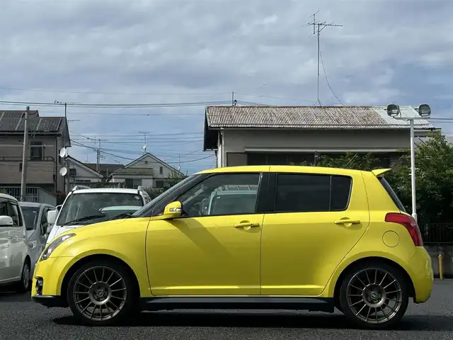 スズキ スイフト スポーツ 東京都 2010(平22)年 12.1万km チャンピオンイエロー 社外メモリグナビ（AVIC-RZ901）/・ワンセグTV/Bluetooth/iPod/AUX/USB/ENKEI製17インチアルミホイール/Monster　Sport製フロアマット/Monster　Sport製エアインダクションボックス/SUZUKI　SPORTS製エアクリーナー/TEIN製車高調整キット/HKS製マフラー/ETC/オートライト/カーテンエアバック/スマートキー/保証書/取説書