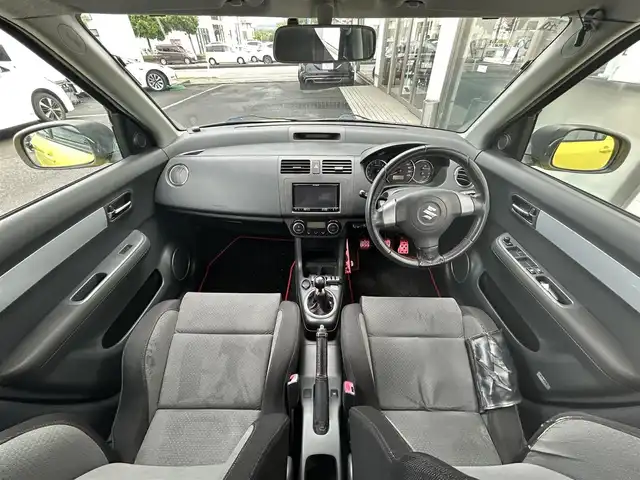 スズキ スイフト スポーツ 東京都 2010(平22)年 12.1万km チャンピオンイエロー 社外メモリグナビ（AVIC-RZ901）/・ワンセグTV/Bluetooth/iPod/AUX/USB/ENKEI製17インチアルミホイール/Monster　Sport製フロアマット/Monster　Sport製エアインダクションボックス/SUZUKI　SPORTS製エアクリーナー/TEIN製車高調整キット/HKS製マフラー/ETC/オートライト/カーテンエアバック/スマートキー/保証書/取説書