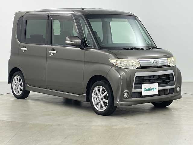 ダイハツ タント カスタム X 道央・札幌 2010(平22)年 8万km ブロンズオリーブパールメタリック ・４ＷＤ/・社外ナビ＆ＴＶ＆ＢＴ＆ＤＶＤ＆ＣＤ/・バックカメラ/・寒冷地仕様/・片側パワースライドドア/・スマートキー/・社外リモコンスターター/・ＨＩＤヘッドライト/・純正１４インチアルミ