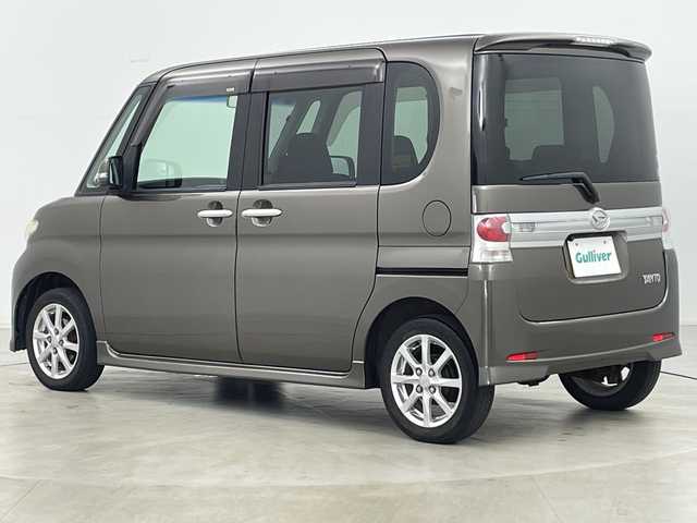 ダイハツ タント カスタム X 道央・札幌 2010(平22)年 8万km ブロンズオリーブパールメタリック ・４ＷＤ/・社外ナビ＆ＴＶ＆ＢＴ＆ＤＶＤ＆ＣＤ/・バックカメラ/・寒冷地仕様/・片側パワースライドドア/・スマートキー/・社外リモコンスターター/・ＨＩＤヘッドライト/・純正１４インチアルミ