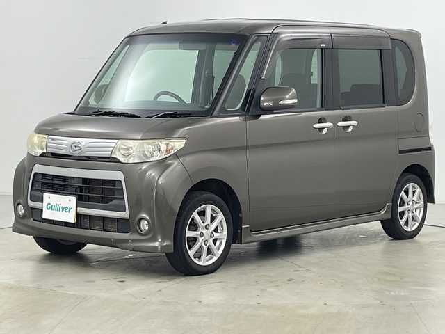 ダイハツ タント カスタム X 道央・札幌 2010(平22)年 8万km ブロンズオリーブパールメタリック ・４ＷＤ/・社外ナビ＆ＴＶ＆ＢＴ＆ＤＶＤ＆ＣＤ/・バックカメラ/・寒冷地仕様/・片側パワースライドドア/・スマートキー/・社外リモコンスターター/・ＨＩＤヘッドライト/・純正１４インチアルミ