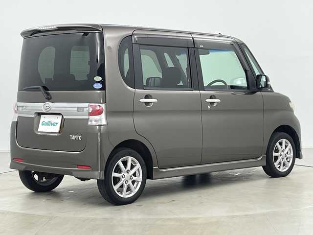 ダイハツ タント カスタム X 道央・札幌 2010(平22)年 8万km ブロンズオリーブパールメタリック ・４ＷＤ/・社外ナビ＆ＴＶ＆ＢＴ＆ＤＶＤ＆ＣＤ/・バックカメラ/・寒冷地仕様/・片側パワースライドドア/・スマートキー/・社外リモコンスターター/・ＨＩＤヘッドライト/・純正１４インチアルミ