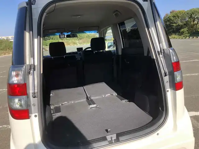 ホンダ ゼスト スパーク W 福岡県 2011(平23)年 10.7万km プレミアムホワイトパール 純正ナビ【VXM-118VS】/　ワンセグTV/CD/DVD/バックカメラ/ウィンカーミラー/ドアバイザー/純正フロアマット/社外15インチアルミホイール/柿本マフラー/保証書/取扱説明書