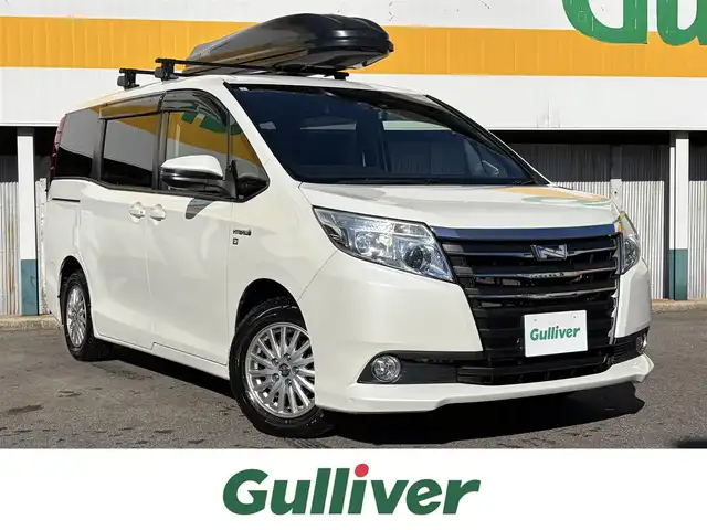 トヨタ ノア ハイブリッド G 三重県 2017(平29)年 12万km ホワイトパールクリスタルシャイン ワンオーナー/Toyota Safety Sense C/　・プリクラッシュセーフティシステム/　・レーンディパーチャーアラート/　・オートマチックハイビーム/アルパインナビ/　・Bluetooth/　・フルセグTV/　・SD録音/　・DVD/CD再生/ベットキット/ルーフキャリー/両側ワンタッチパワースライドドア/スマートキーx２/プッシュスタート/クルーズコントロール/D/N席シートヒーター/LEDヘッドライト/LEDフォグ/オートライト/オートリトラクタブルミラー/ウィンカーミラー/革巻きステアリング/ステアリングスイッチ/ドライブレコーダー/ビルトインETC/ドアバイザー/サイド/カーテン/ニーエアバック