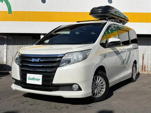 トヨタ ノア ハイブリッド G 三重県 2017(平29)年 12万km ホワイトパールクリスタルシャイン ワンオーナー/Toyota Safety Sense C/　・プリクラッシュセーフティシステム/　・レーンディパーチャーアラート/　・オートマチックハイビーム/アルパインナビ/　・Bluetooth/　・フルセグTV/　・SD録音/　・DVD/CD再生/ベットキット/ルーフキャリー/両側ワンタッチパワースライドドア/スマートキーx２/プッシュスタート/クルーズコントロール/D/N席シートヒーター/LEDヘッドライト/LEDフォグ/オートライト/オートリトラクタブルミラー/ウィンカーミラー/革巻きステアリング/ステアリングスイッチ/ドライブレコーダー/ビルトインETC/ドアバイザー/サイド/カーテン/ニーエアバック