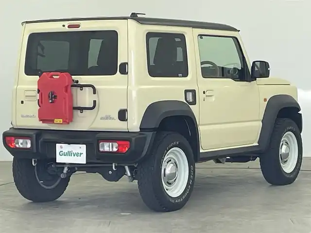スズキ ジムニー シエラ JC 大分県 2022(令4)年 2.9万km シフォンアイボリーメタリックブラック2トーンルーフ 社外ディスプレイオーディオ/・Bluetooth・AM・FM・iPod/バックカメラ/4WD/衝突軽減ブレーキ/車線逸脱防止システム/アイドリングストップ/ヘッドライトウォッシャー/横滑り防止装置/セルディセントコントロール/ETC/本革巻きステアリング/前席シートヒーター/DEAＮ製16インチＡＷ/ＬＥＤヘッドライト/フォグランプ/シートカバー/ステアリングリモコン/プッシュスタート/スマートキー/オートライト/純正フロアマット