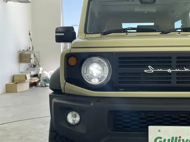スズキ ジムニー シエラ JC 大分県 2022(令4)年 2.9万km シフォンアイボリーメタリックブラック2トーンルーフ 社外ディスプレイオーディオ/・Bluetooth・AM・FM・iPod/バックカメラ/4WD/衝突軽減ブレーキ/車線逸脱防止システム/アイドリングストップ/ヘッドライトウォッシャー/横滑り防止装置/セルディセントコントロール/ETC/本革巻きステアリング/前席シートヒーター/DEAＮ製16インチＡＷ/ＬＥＤヘッドライト/フォグランプ/シートカバー/ステアリングリモコン/プッシュスタート/スマートキー/オートライト/純正フロアマット