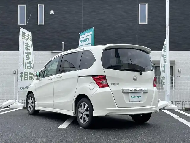ホンダ フリード FLEXエアロ 三重県 2009(平21)年 11万km プレミアムホワイトパール 登録時109677km/ワンオーナー/禁煙車/純正ナビ/（AM/FM/TV）/ワンセグTV/バックカメラ/ETC/ステアリングスイッチ/オートライト/片側パワスラ/純正フロアマット/純正アルミ
