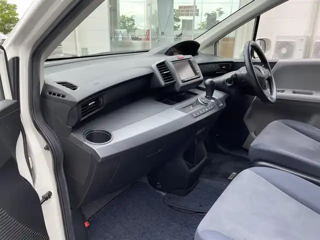 ホンダ フリード FLEXエアロ 三重県 2009(平21)年 11万km プレミアムホワイトパール 登録時109677km/ワンオーナー/禁煙車/純正ナビ/（AM/FM/TV）/ワンセグTV/バックカメラ/ETC/ステアリングスイッチ/オートライト/片側パワスラ/純正フロアマット/純正アルミ